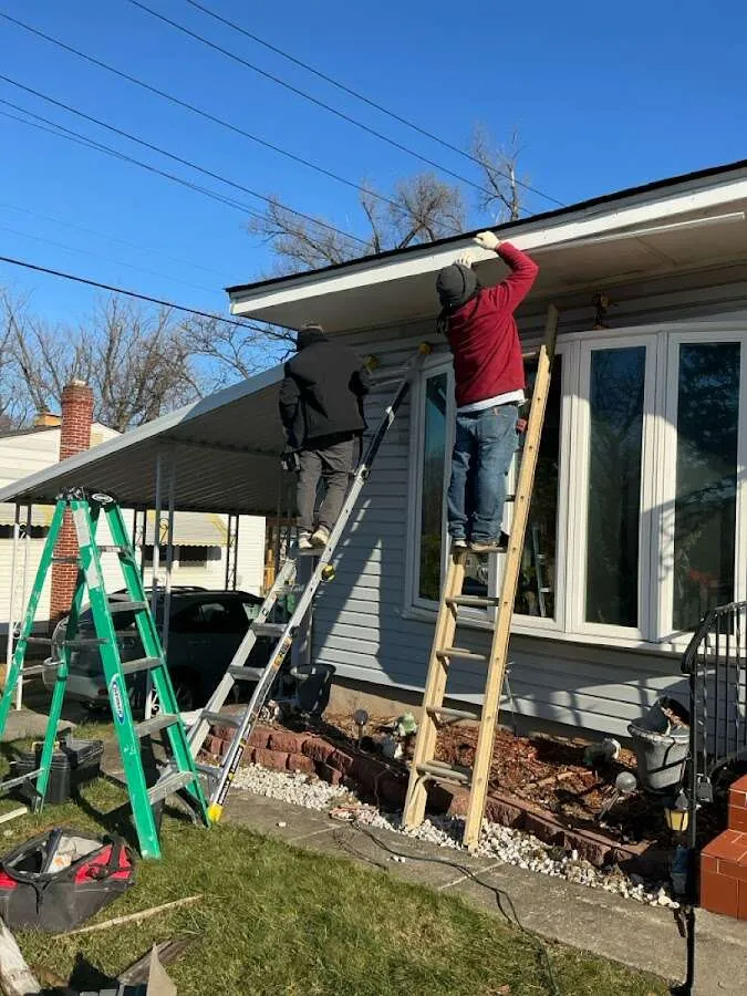 Restoration crew performing exterior repair in Fort Mitchell